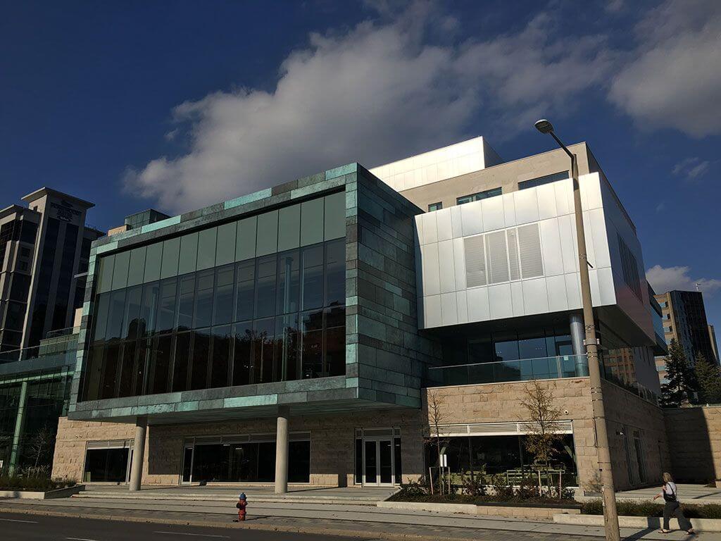 McMaster University building with a large architectural patina installation